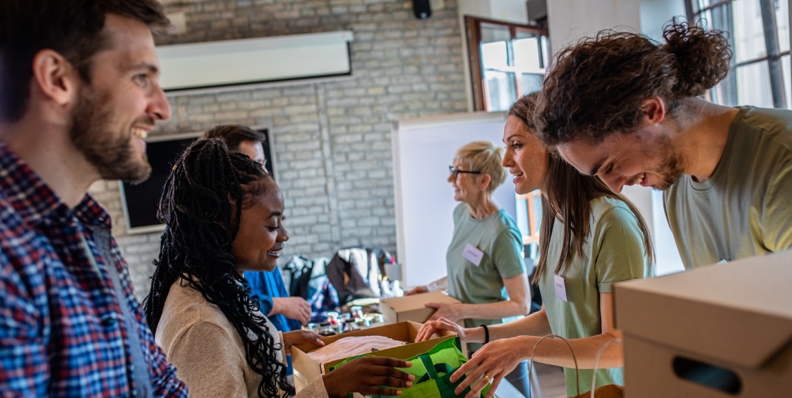 People volunteering at community charity event