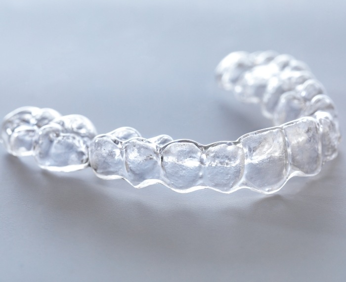 Invisalign clear aligner on tabletop