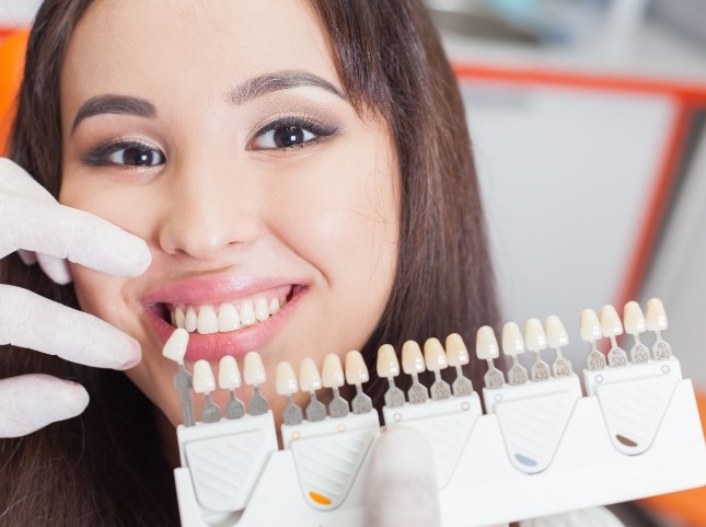 Young woman getting dental veneers from her San Ramon cosmetic dentist