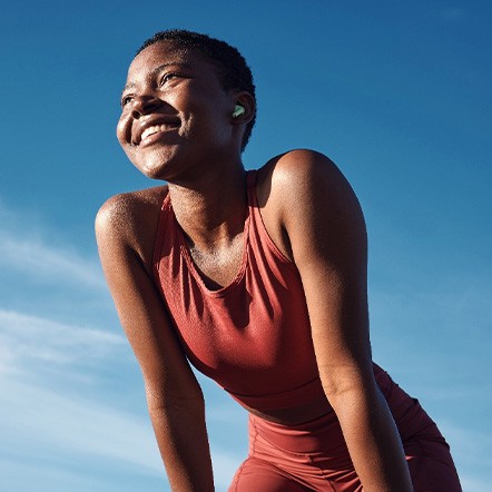 Lady smiles outdoors