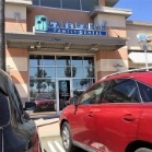 Two cars parked in front of Gale Ranch Family Dental