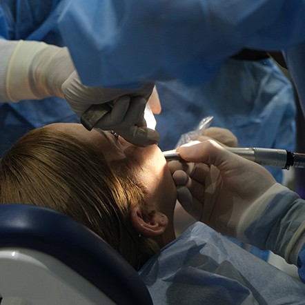 Woman getting a dental procedure