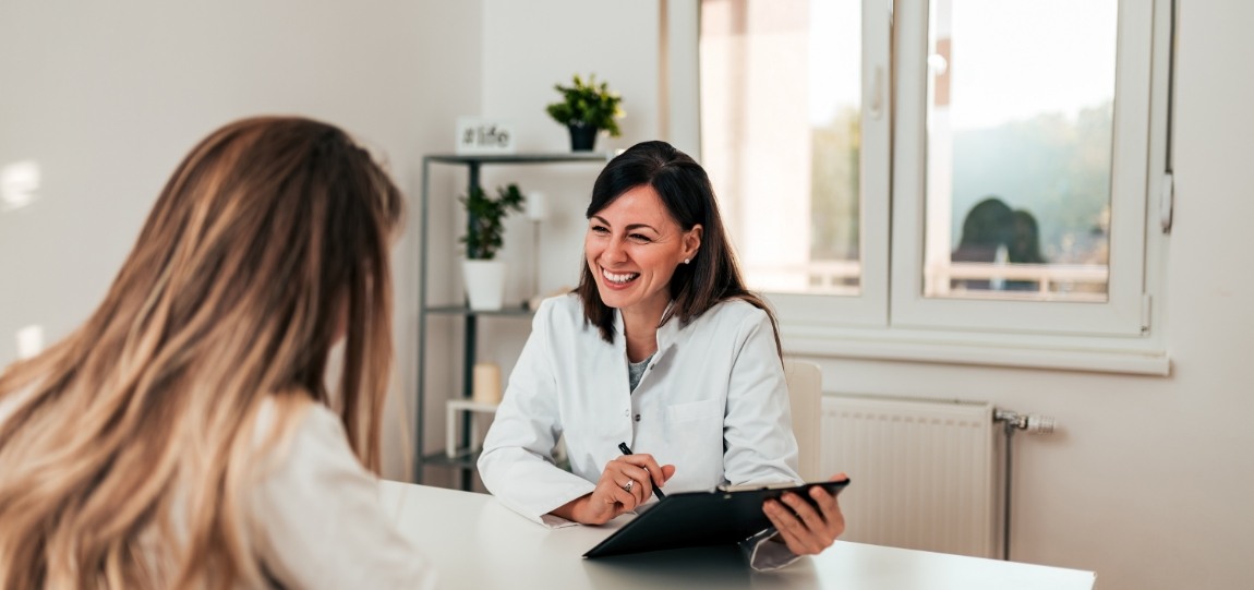 Woman at consultation with San Ramon dentist