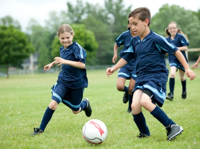 Group of kids playing soccer